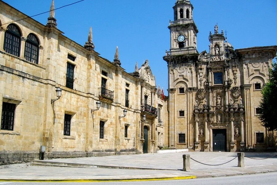 The baroque facade of the monastery of San Salvador de Lourenzá, with its clock tower